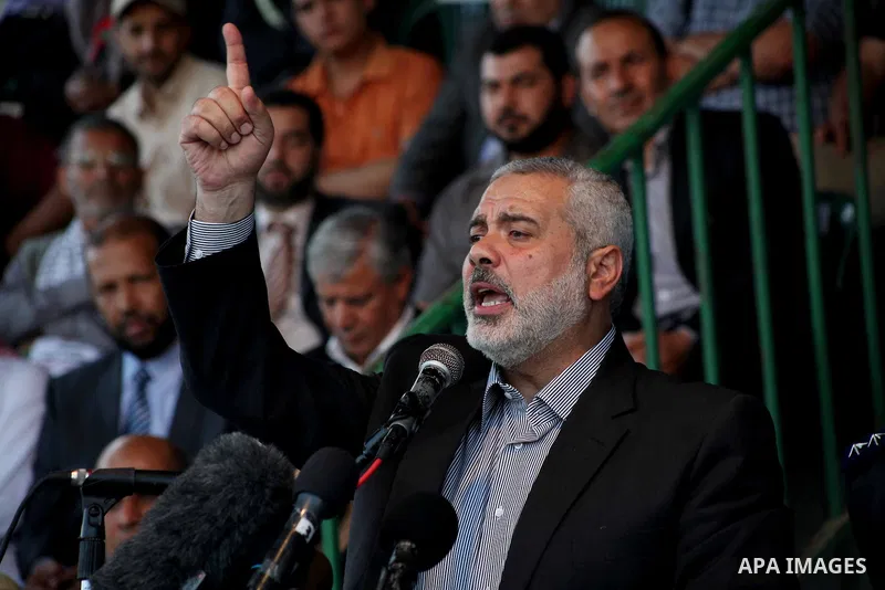 Palestinian Prime Minister in Gaza Ismail Hanyeh, speaks during a graduation police officers ceremony at the police academy in Gaza City on June 13, 2012, making them the first batch of officers to graduate after four ye...