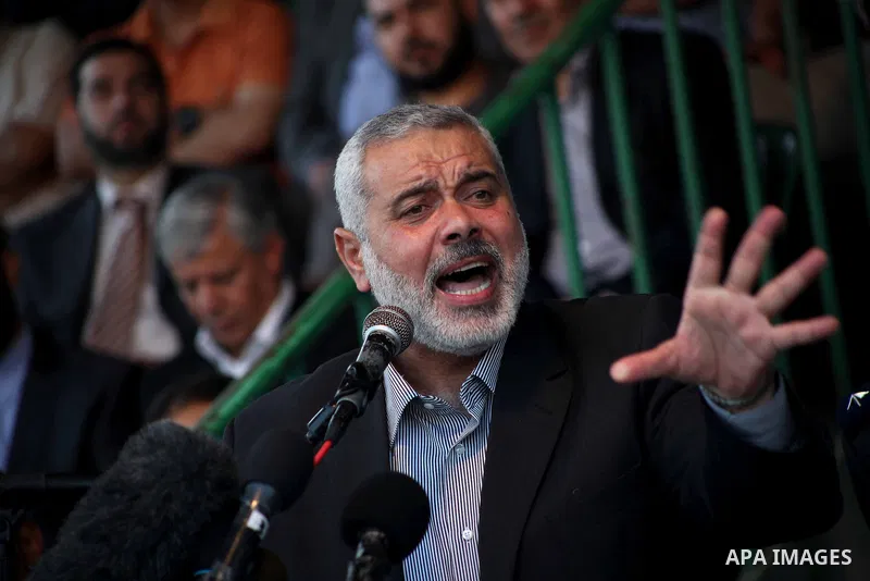 Palestinian Prime Minister in Gaza Ismail Hanyeh, speaks during a graduation police officers ceremony at the police academy in Gaza City on June 13, 2012, making them the first batch of officers to graduate after four ye...