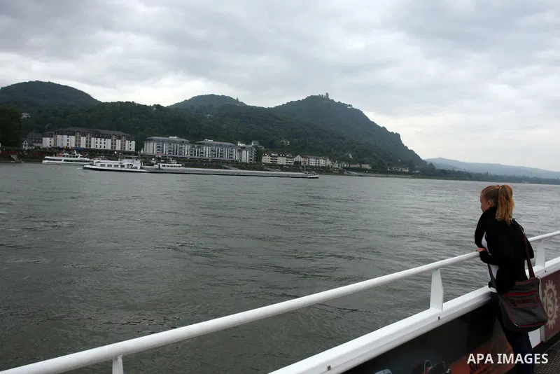 Ships in the River Rhine near the city of Bonn in Germany on 15 June 2012. The Rhine is one of the longest and most important rivers in Europe. It runs for over 1,232 km .Rhine flows through six countries -Switzerland, P...