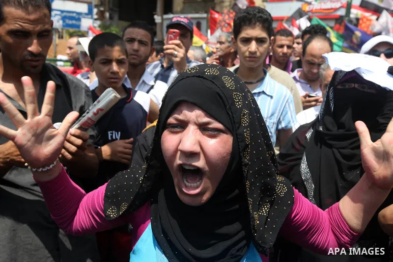 Egyptian protesters take part in a demonstration at Tahrir square in Cairo June 15, 2012. Egypt's supreme court ruled on Thursday to dissolve the Islamist-led parliament, plunging a troubled transition to democracy into...
