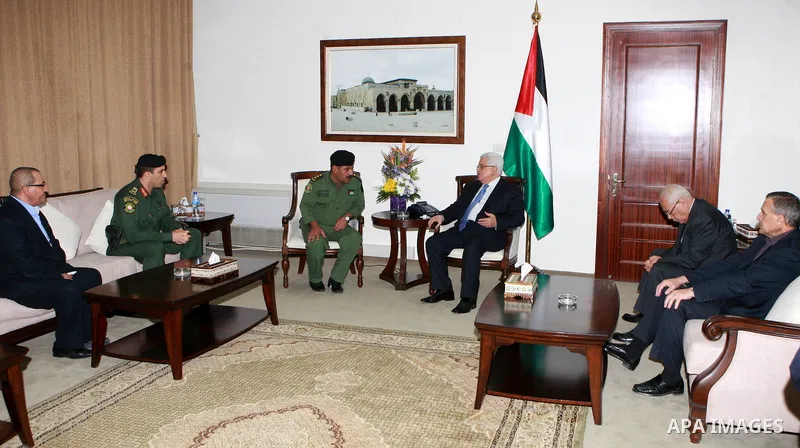 Palestinian President, Mahmoud Abbas (Abu Mazen) meeting with the martyr's father, Ahmed Qasim, in the West Bank city of Ramallah, on June 16, 2012. Photo by Thaer Ganaim