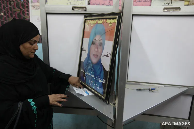Egyptian women vote at a polling station in Cairo, Egypt on Saturday, June 16, 2012. Egyptians voted Saturday in the country's landmark presidential runoff, choosing between Hosni Mubarak's ex-prime minister and an Islam...