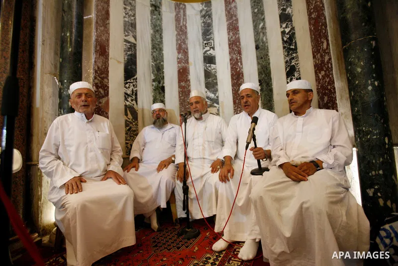 Islamic Singing choir take part in a celebration of the Islamic holiday of Isra Mi'raj in the Al-Aqsa mosque, in the Jerusalem old city, on June 17, 2012. The holiday marks what Muslims believe is Prophet Mohammad's jour...