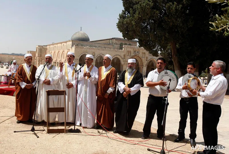 Islamic Singing choir take part in a celebration of the Islamic holiday of Isra Mi'raj in the Al-Aqsa mosque, in the Jerusalem old city, on June 17, 2012. The holiday marks what Muslims believe is Prophet Mohammad's jour...