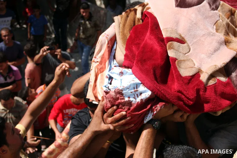 Palestinians carry the dead body of Naim al-Najar during his funeral in the West Bank village of Idhna, near Hebron, Sunday, June 17, 2012. An Israeli tow truck driver shot dead two Palestinians and wounded one Sunday du...