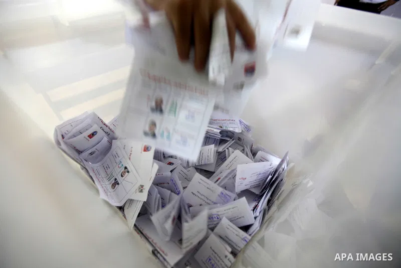 Officials count ballots after polls closed in Cairo June 17, 2012. Egyptians began an anxious wait for their first freely elected president on Sunday after two days of voting that was to be the culmination of their Arab...