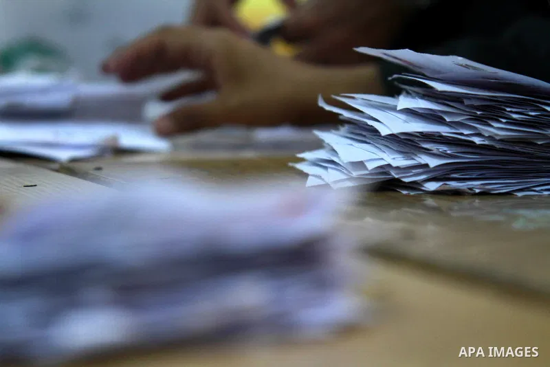 Electoral workers count ballots during the second day of voting in Egypt's presidential election, at a polling station in Cairo June 17, 2012. Egyptians began an anxious wait for their first freely elected president on S...