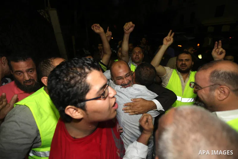 Supporters of Egypt's Muslim Brotherhood candidate Mohammed Mursi celebrate after the announcement of presidential election results in Cairo on June 18, 2012. The campaign of Egyptian presidential candidate Ahmed Shafiq...