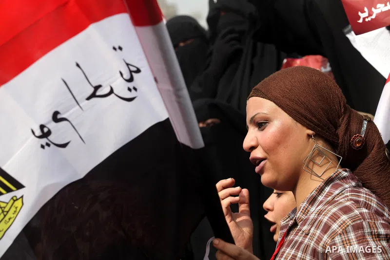 Supporters of presidential candidate Mohammed Morsi carry Egyptian and Muslim Brotherhood flags during celebrations claiming victory in Tahrir Square, Cairo, Egypt, Monday, June 18, 2012. The Muslim Brotherhood declared...