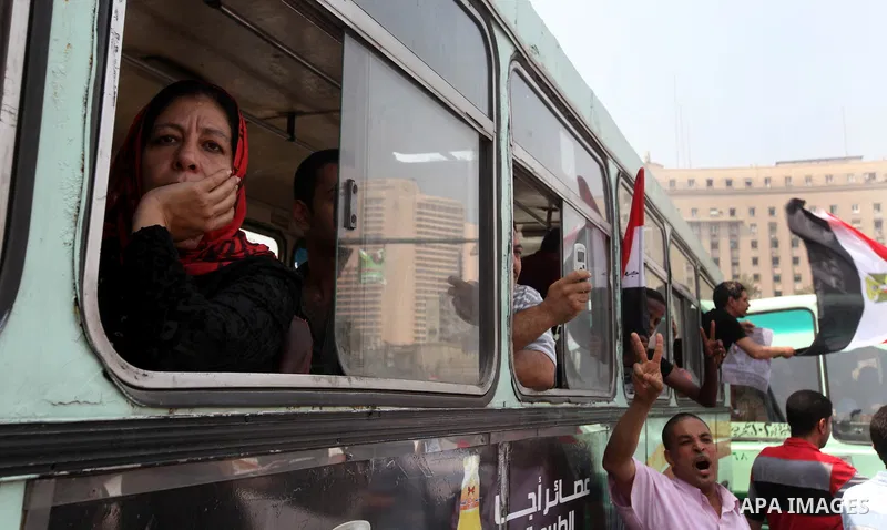 Supporters of Egypt's Muslim Brotherhood candidate Mohammed Morsi celebrate in Tahrir square after the Brotherhood claimed win in presidential vote, in Cairo, Egypt, 18 June 2012. Hundreds of Muslim Brotherhood supporter...