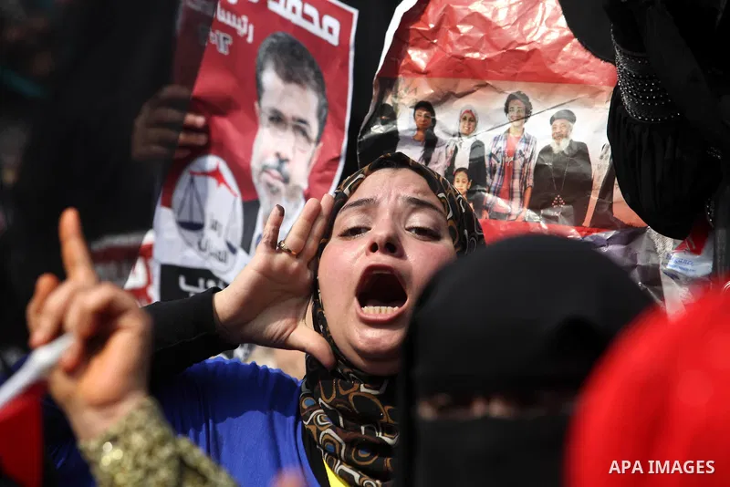 Supporters of Egypt's Muslim Brotherhood candidate Mohammed Morsi celebrate in Tahrir square after the Brotherhood claimed win in presidential vote, in Cairo, Egypt, 18 June 2012. Hundreds of Muslim Brotherhood supporter...
