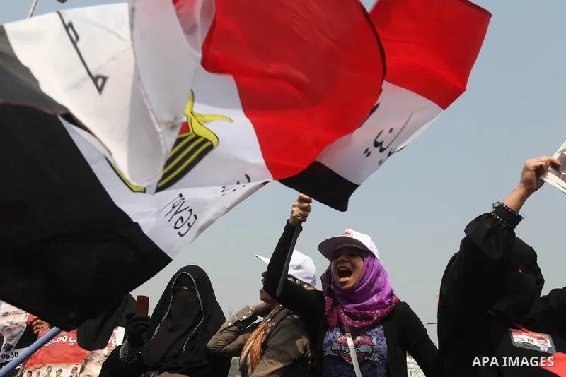 Supporters of Egypt's Muslim Brotherhood candidate Mohammed Morsi celebrate in Tahrir square after the Brotherhood claimed win in presidential vote, in Cairo, Egypt, 18 June 2012. Hundreds of Muslim Brotherhood supporter...