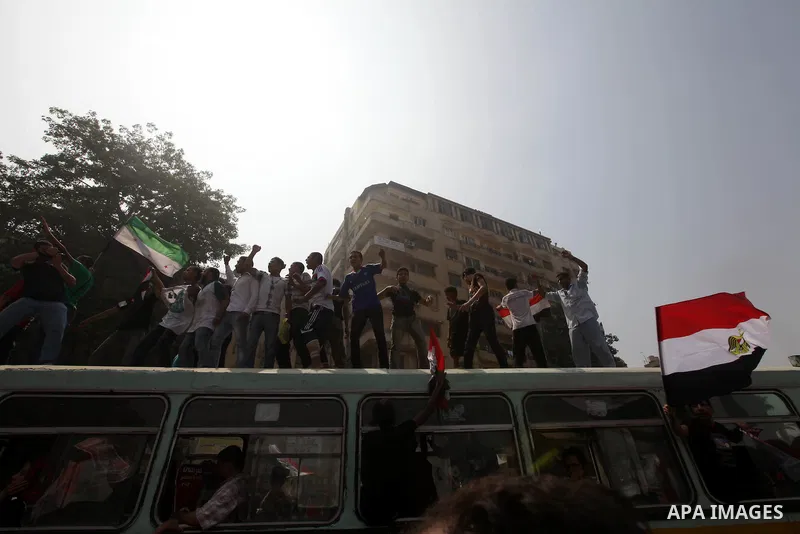 Supporters of Egypt's Muslim Brotherhood candidate Mohammed Morsi celebrate in Tahrir square after the Brotherhood claimed win in presidential vote, in Cairo, Egypt, 18 June 2012. Hundreds of Muslim Brotherhood supporter...