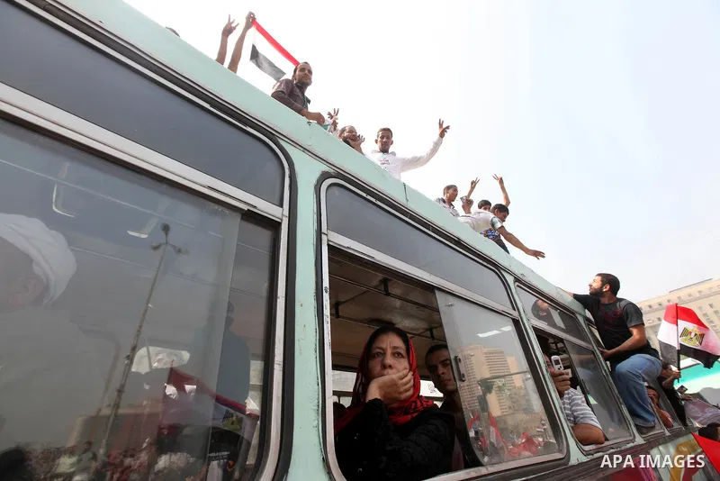 Supporters of Egypt's Muslim Brotherhood candidate Mohammed Morsi celebrate in Tahrir square after the Brotherhood claimed win in presidential vote, in Cairo, Egypt, 18 June 2012. Hundreds of Muslim Brotherhood supporter...