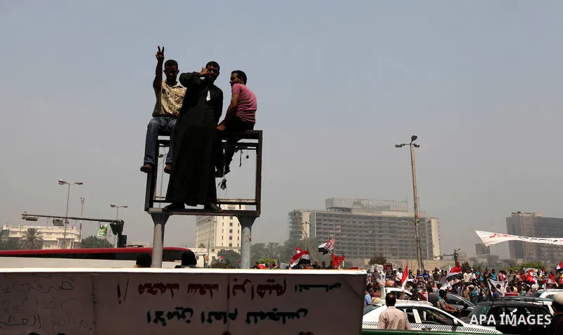 Supporters of Egypt's Muslim Brotherhood candidate Mohammed Morsi celebrate in Tahrir square after the Brotherhood claimed win in presidential vote, in Cairo, Egypt, 18 June 2012. Hundreds of Muslim Brotherhood supporter...