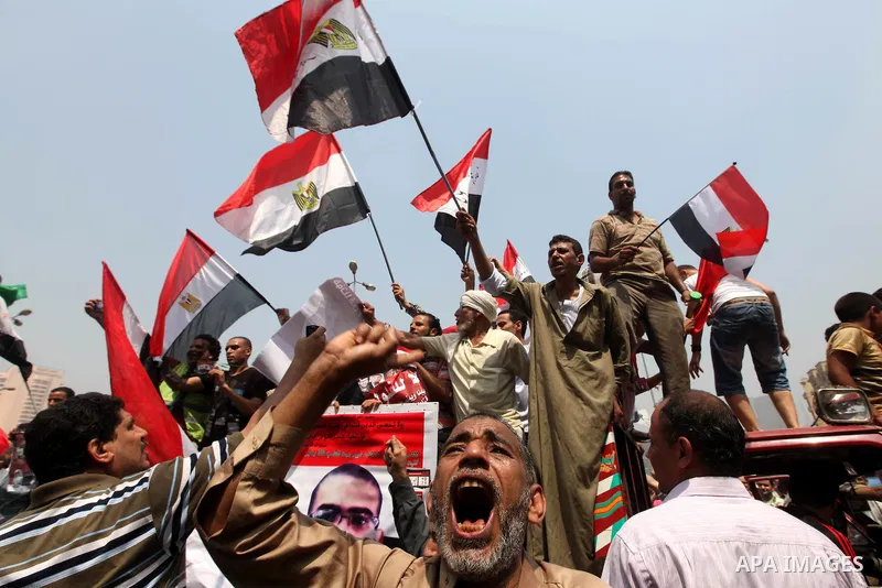 Supporters of Egypt's Muslim Brotherhood candidate Mohammed Morsi celebrate in Tahrir square after the Brotherhood claimed win in presidential vote, in Cairo, Egypt, 18 June 2012. Hundreds of Muslim Brotherhood supporter...