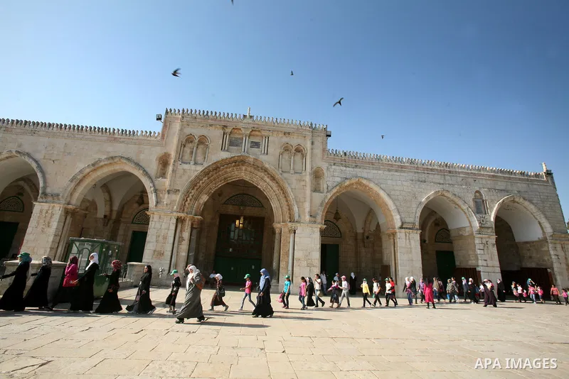 Palestinian children participate in summer camps at Al-Aqsa mosque in the old city of Jerusalem on 19 June 2012. Photo by Mahfouz Abu Turk