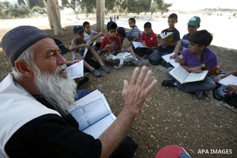 Palestinian children participate in summer camps at Al-Aqsa mosque in the old city of Jerusalem on 19 June 2012. Photo by Mahfouz Abu Turk