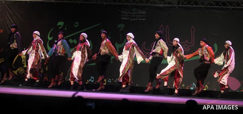 shows members of a local Palestinian dance company presenting their show during a dance festival Beir Ziet Nights (Liali Ber Ziet) at Ber Ziet University near the West Bank town of Ramallah, 18 June 2012. Photo by Issam...