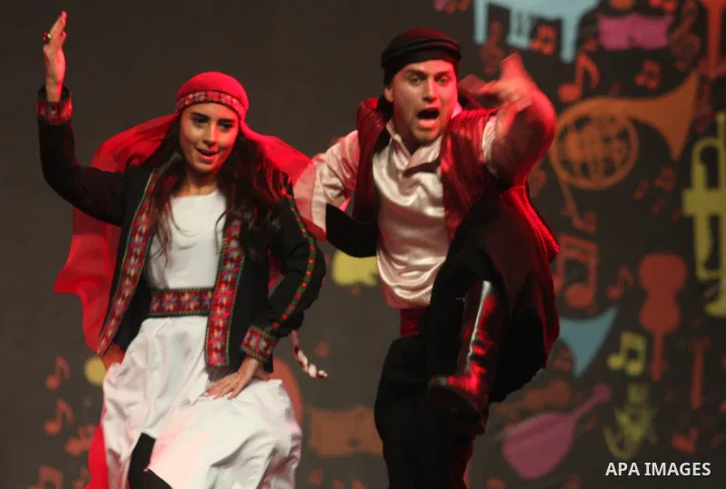 shows members of a local Palestinian dance company presenting their show during a dance festival Beir Ziet Nights (Liali Ber Ziet) at Ber Ziet University near the West Bank town of Ramallah, 18 June 2012. Photo by Issam...
