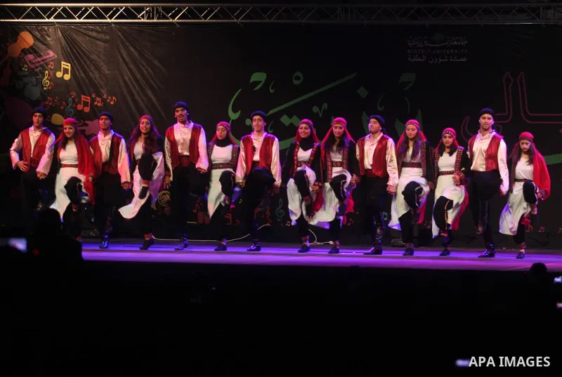 shows members of a local Palestinian dance company presenting their show during a dance festival Beir Ziet Nights (Liali Ber Ziet) at Ber Ziet University near the West Bank town of Ramallah, 18 June 2012. Photo by Issam...