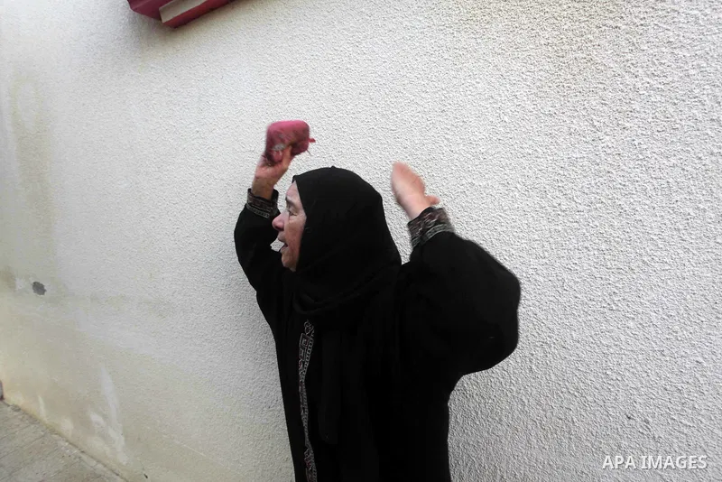 Relatives of Palestinian Mohammed abu Maleg mourn during his funeral in Al-Maghazi refugee camp in the central Gaza Strip June 19, 2012. An Israeli air strike killed two Palestinians, one of them abu Maleg, in the Gaza S...
