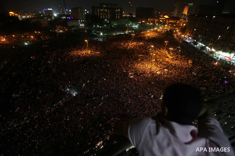 General view shows Egyptian protesters shouting slogans against the new constitutional document and the military council after the Brotherhood claimed win in presidential vote, in Tahrir square, Cairo, Egypt, 19 June 201...