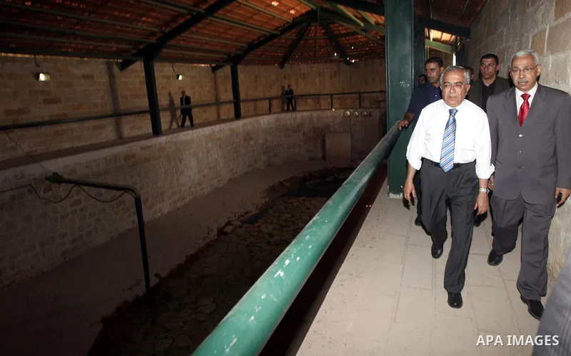 Palestinian Prime Minister Salam Fayyad, visits Ein Sultan spring water and sets the corner stone in the West Bank city of Jericho on June 20, 2012.. Photo by Mustafa Abu Dayeh