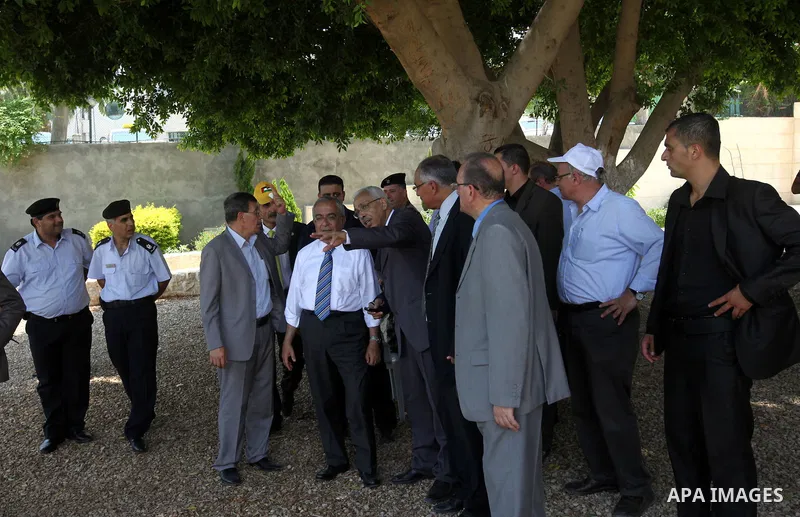 Palestinian Prime Minister Salam Fayyad, visits Ein Sultan spring water and sets the corner stone in the West Bank city of Jericho on June 20, 2012.. Photo by Mustafa Abu Dayeh