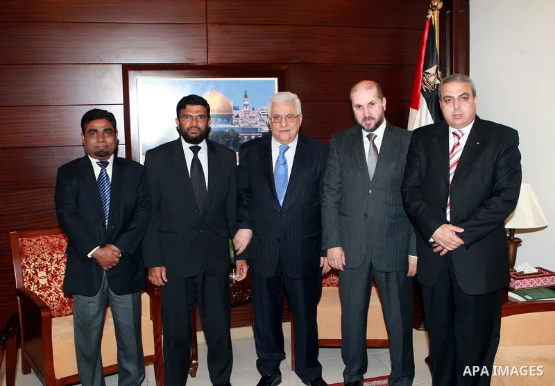 Palestinian President, Mahmoud Abbas (Abu Mazen) meets with Maldives Islamic Affairs Minister Mohammed didi, in the West Bank city of Ramallah, on June 21, 2012. Photo by Mohammed al-Atiq