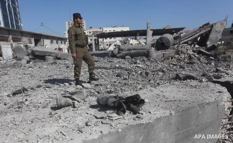 Palestinian Hamas security personnel inspect the damage at al-Saraya Security complex in the centre of Gaza City on June 23, 2012 as Israel launched fresh air strikes on the Gaza Strip overnight after killing two people...