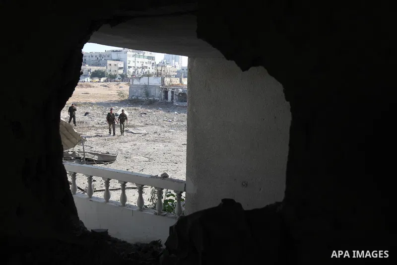 A Palestinian Hamas security personnel inspects the damage at al-Saraya Security complex in the centre of Gaza City on June 23, 2012 as Israel launched fresh air strikes on the Gaza Strip overnight after killing two peop...