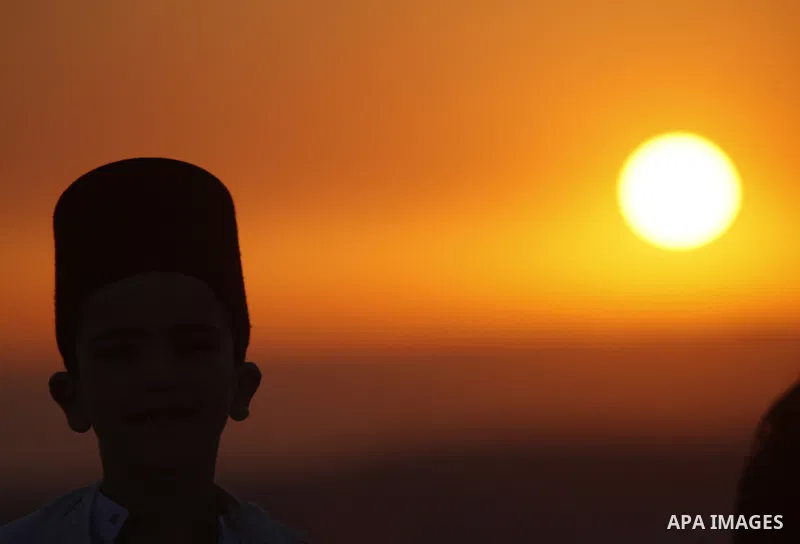 Samaritans attend Shavuot festival on Mount Gerizim near the northern West Bank city of Nablus on June 24, 2012 which is giving of the Torah at Mount Sinai seven weeks after the exodus of the Jewish people from Egypt. Th...
