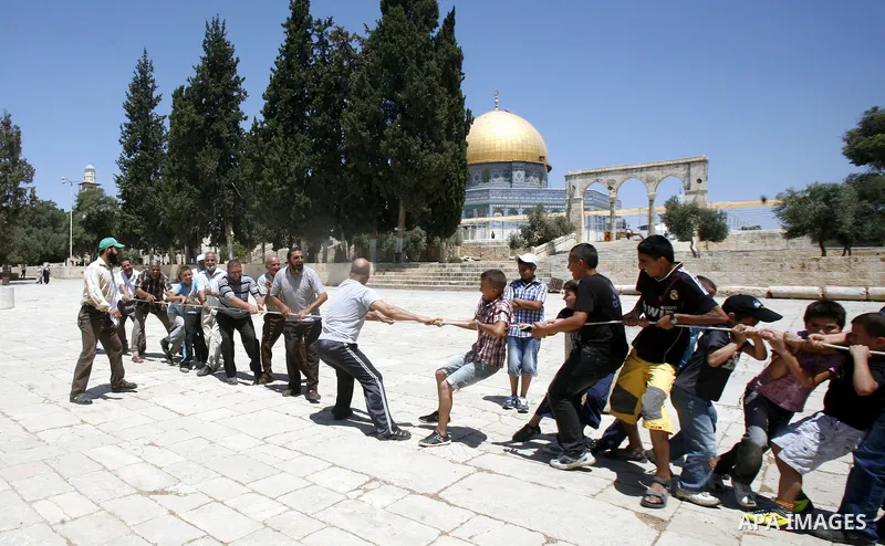 Palestinian children participate in summer camps at Al-Aqsa mosque in the old city of Jerusalem on 24 June 2012. Photo by Mahfouz Abu Turk.