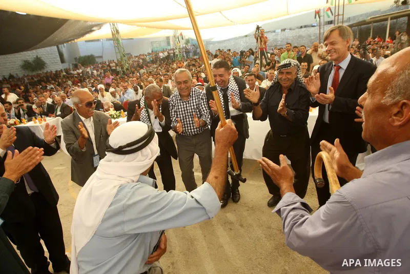 Palestinian Prime Minister, Salam Fayyad attends the opening of several centers in Hebron, in the West Bank of Hebron on June 24, 2012. Photo by Mahmoud Hrebat