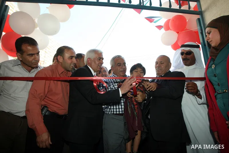 Palestinian Prime Minister, Salam Fayyad attends the opening of the center of Yatta Municipality, in the West Bank of Hebron on June 24, 2012. Photo by Mahmoud Hrebat