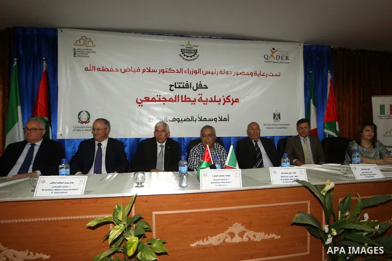 Palestinian Prime Minister, Salam Fayyad attends the opening of the center of Yatta Municipality, in the West Bank of Hebron on June 24, 2012. Photo by Mahmoud Hrebat