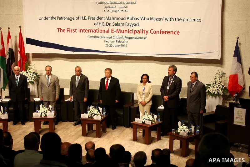 Palestinian Prime Minister, Salam Fayyad speaks during the first International Conference of electronic Municipalities, in the West Bank of Hebron on June 24, 2012. Photo by Mustafa Abu Dayah
