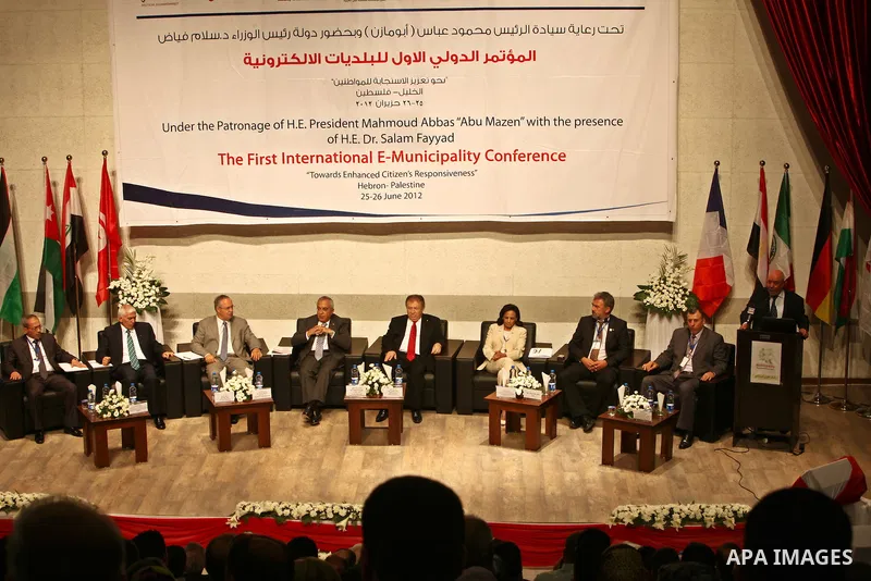 Palestinian Prime Minister, Salam Fayyad speaks during the first International Conference of electronic Municipalities, in the West Bank of Hebron on June 24, 2012. Photo by Mustafa Abu Dayah