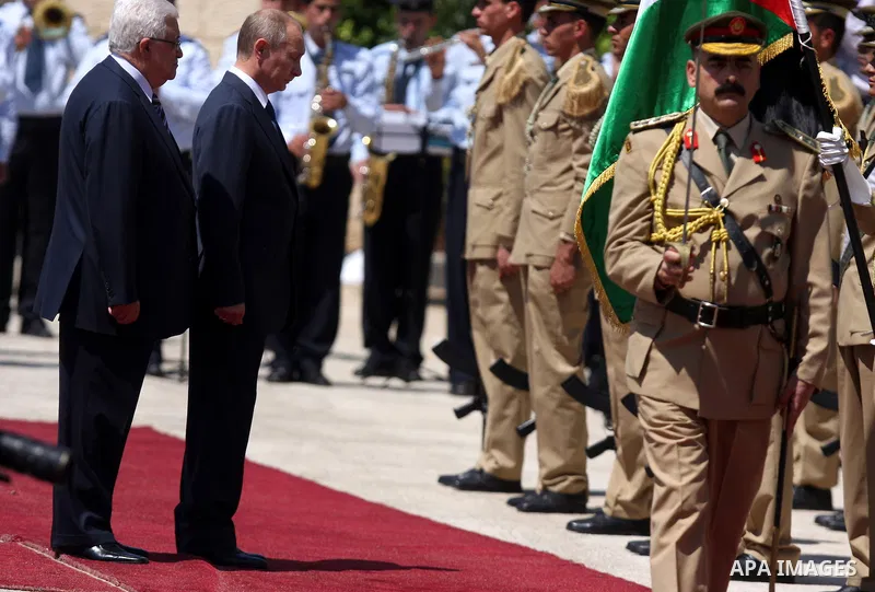 Palestinian President Mahmoud Abbas meets with his Russian counterpart Vladimir Putin at his office in the West Bank city of Bethlehem on June 26, 2012. photo by Issam Rimawi