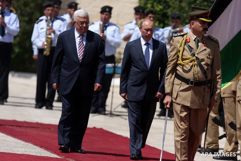 Palestinian President Mahmoud Abbas meets with his Russian counterpart Vladimir Putin at his office in the West Bank city of Bethlehem on June 26, 2012. photo by Issam Rimawi