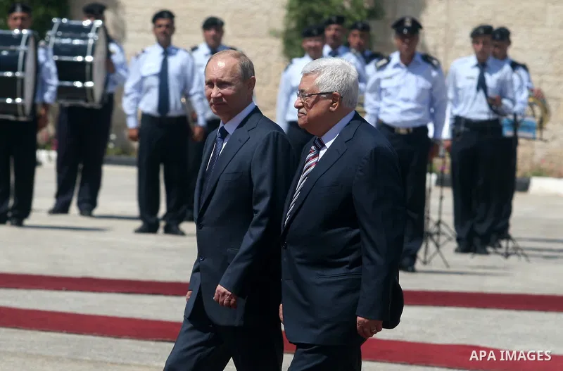 Palestinian President Mahmoud Abbas meets with his Russian counterpart Vladimir Putin at his office in the West Bank city of Bethlehem on June 26, 2012. photo by Issam Rimawi