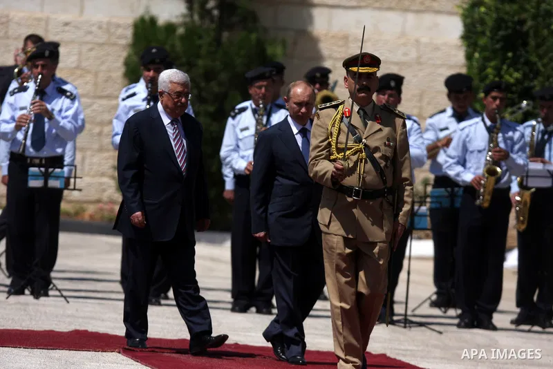 Palestinian President Mahmoud Abbas meets with his Russian counterpart Vladimir Putin at his office in the West Bank city of Bethlehem on June 26, 2012. photo by Issam Rimawi