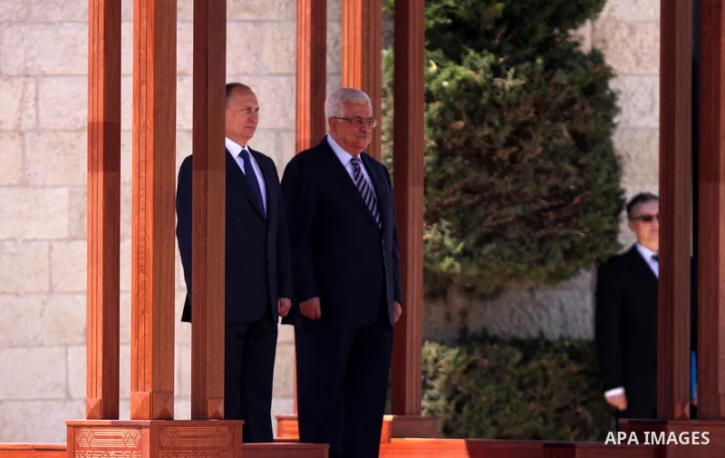Palestinian President Mahmoud Abbas meets with his Russian counterpart Vladimir Putin at his office in the West Bank city of Bethlehem on June 26, 2012. photo by Issam Rimawi