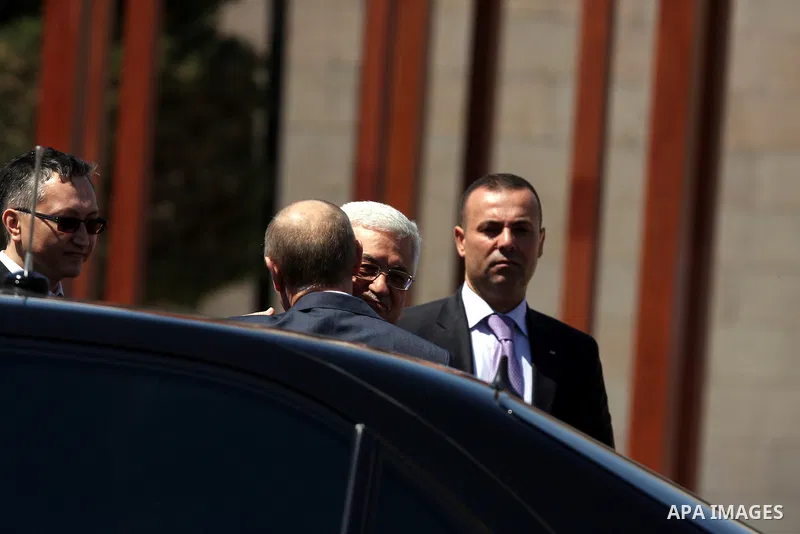 Palestinian President Mahmoud Abbas meets with his Russian counterpart Vladimir Putin at his office in the West Bank city of Bethlehem on June 26, 2012. photo by Issam Rimawi
