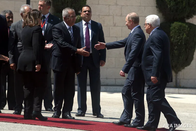 Palestinian President Mahmoud Abbas meets with his Russian counterpart Vladimir Putin at his office in the West Bank city of Bethlehem on June 26, 2012. photo by Issam Rimawi