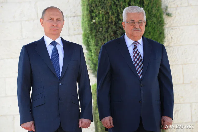 Palestinian President Mahmoud Abbas meets with his Russian counterpart Vladimir Putin at his office in the West Bank city of Bethlehem on June 26, 2012. Photo by Thaer Ganaim