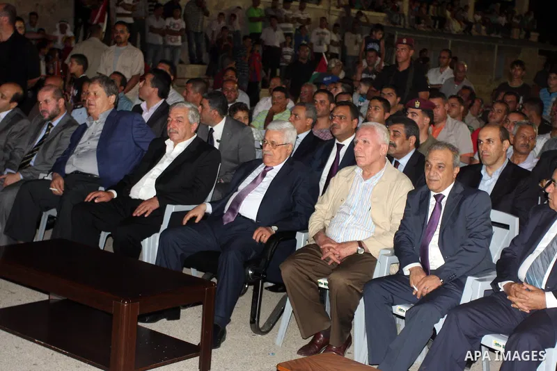 Palestinian President Mahmoud Abbas attends a mass wedding for 19 Groom in the village of Silwad in the West Bank city of Ramallah, June 28, 2012. Photo by Issam Rimawi