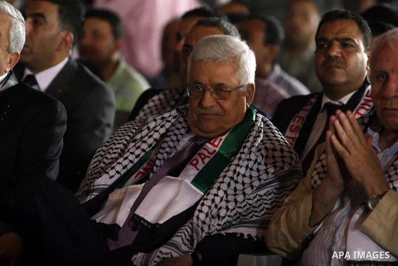 Palestinian President Mahmoud Abbas attends a mass wedding for 19 Groom in the village of Silwad in the West Bank city of Ramallah, June 28, 2012. Photo by Issam Rimawi