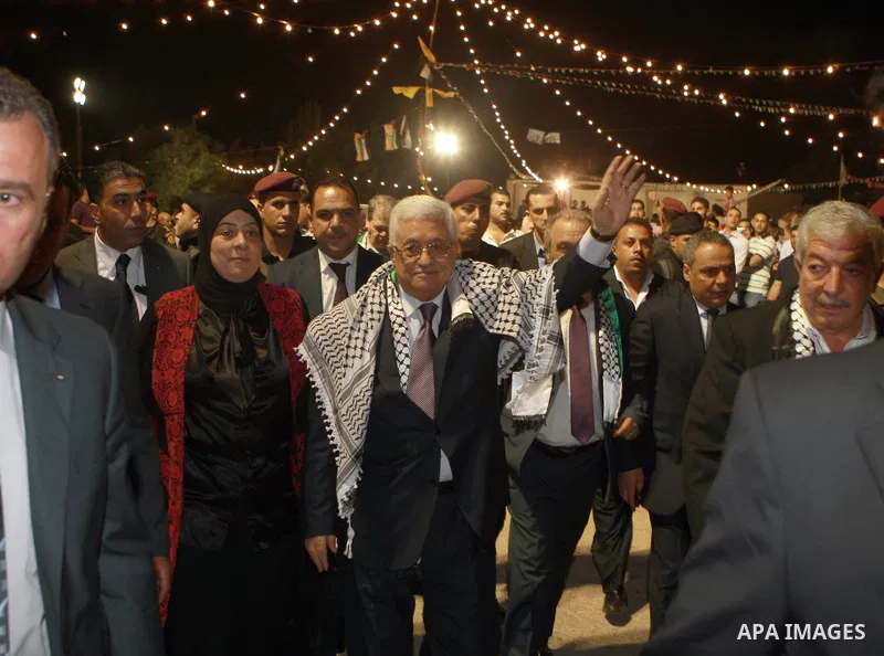 Palestinian President Mahmoud Abbas attends a mass wedding for 19 Groom in the village of Silwad in the West Bank city of Ramallah, June 28, 2012. Photo by Thaer Ganaim